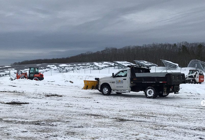 Billy Goat Landscaping snow plow truck